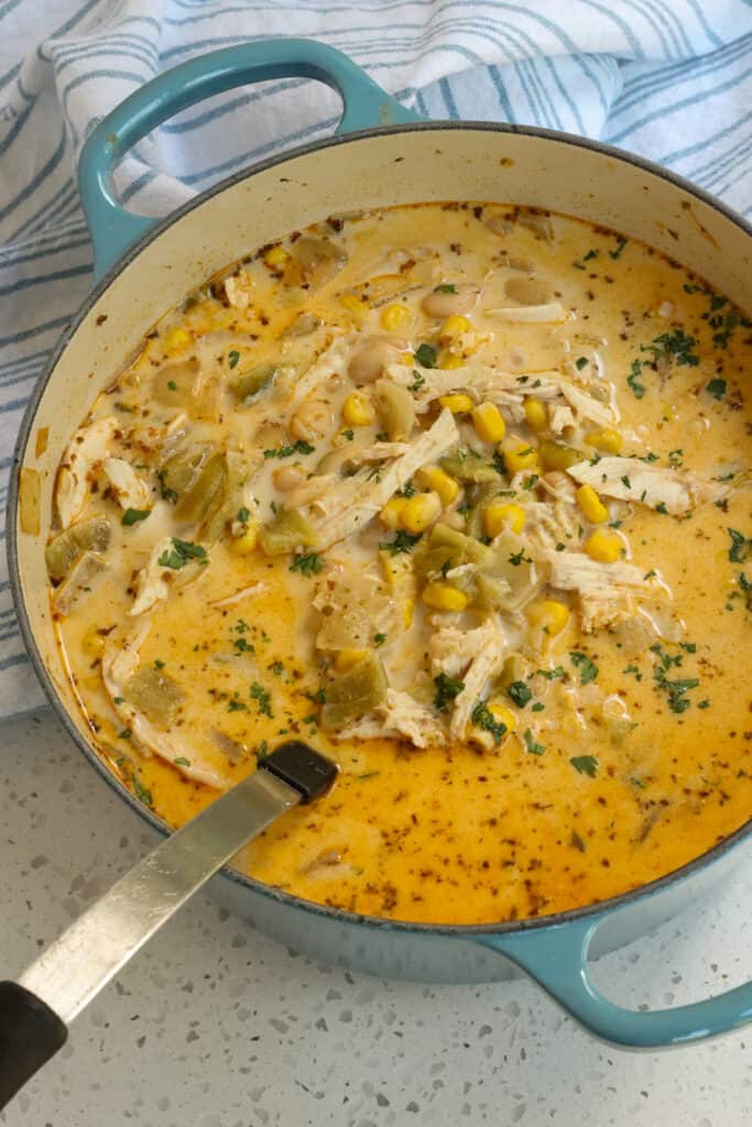 This White Chicken Chili combines Great Northern beans, rotisserie chicken, sweet corn, poblano and Anaheim peppers, onions, garlic and a perfect blend of spices into a wholesome soul warming chili.