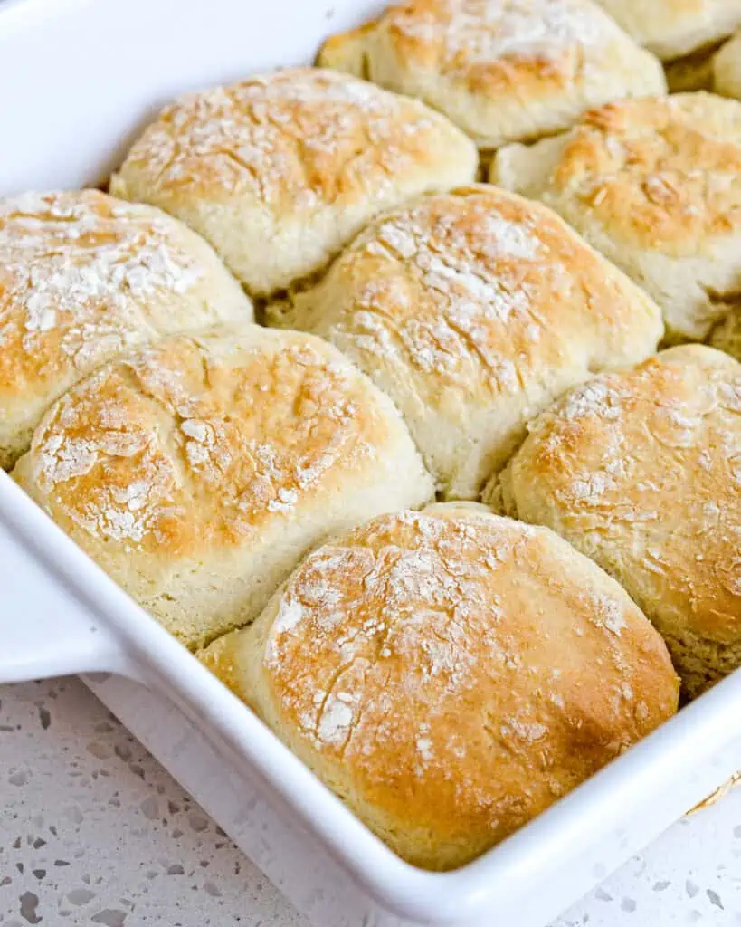 An overhead views of a 9x13 inch baking dish full of 7up biscuits.