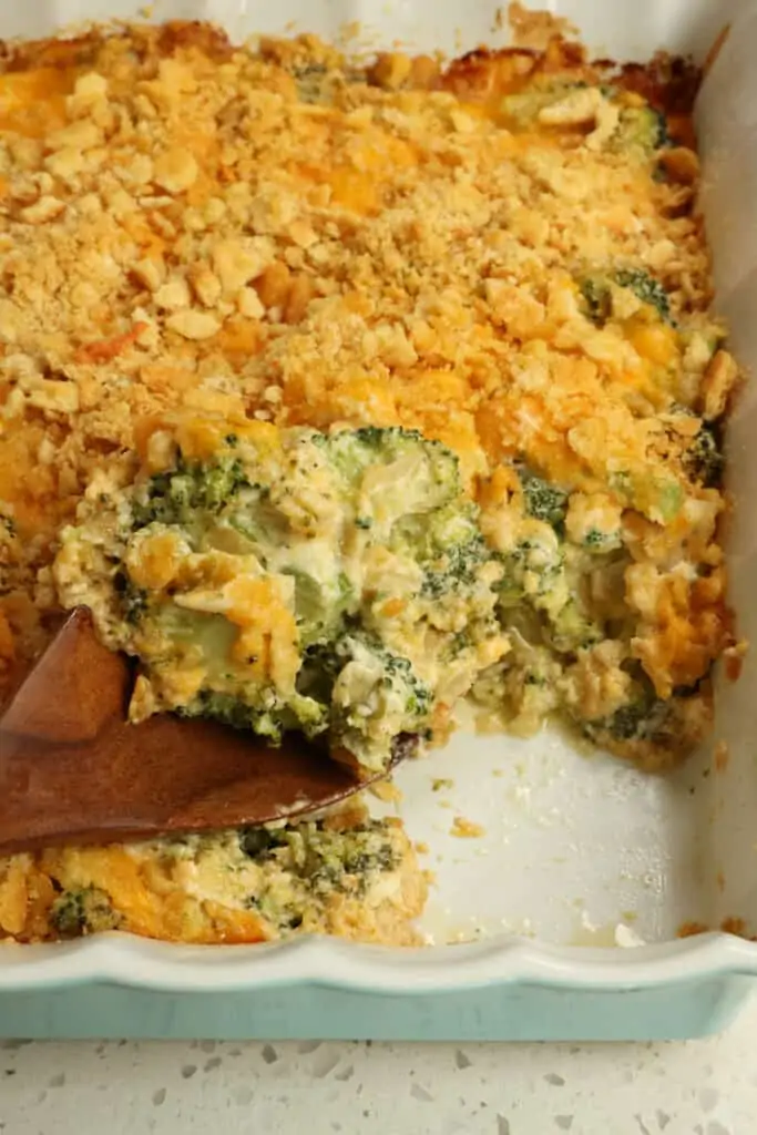 A  Broccoli Cheese Casserole made with fresh broccoli, onions, garlic, and cheddar in a creamy base all topped with melted cheddar and a buttery cracker topping. 