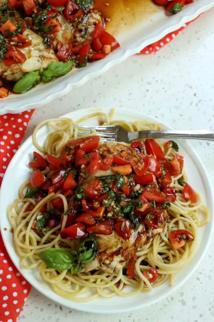 Italian seasoned golden chicken breasts are topped with fresh bruschetta and drizzled with a sweet balsamic vinaigrette.