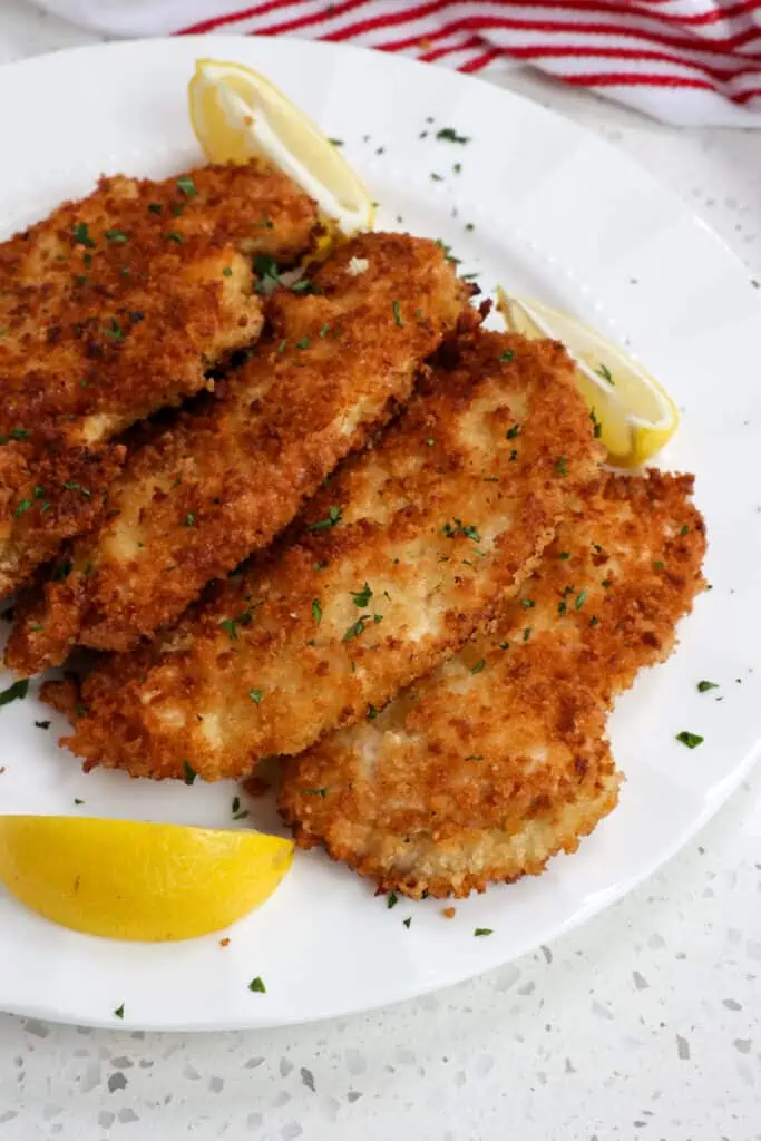 Chicken Schnitzel is a quick and easy dish that even a new cook can master.  I love to serve this with German Potato Salad, homemade spaetzle, or buttered egg noodles. 