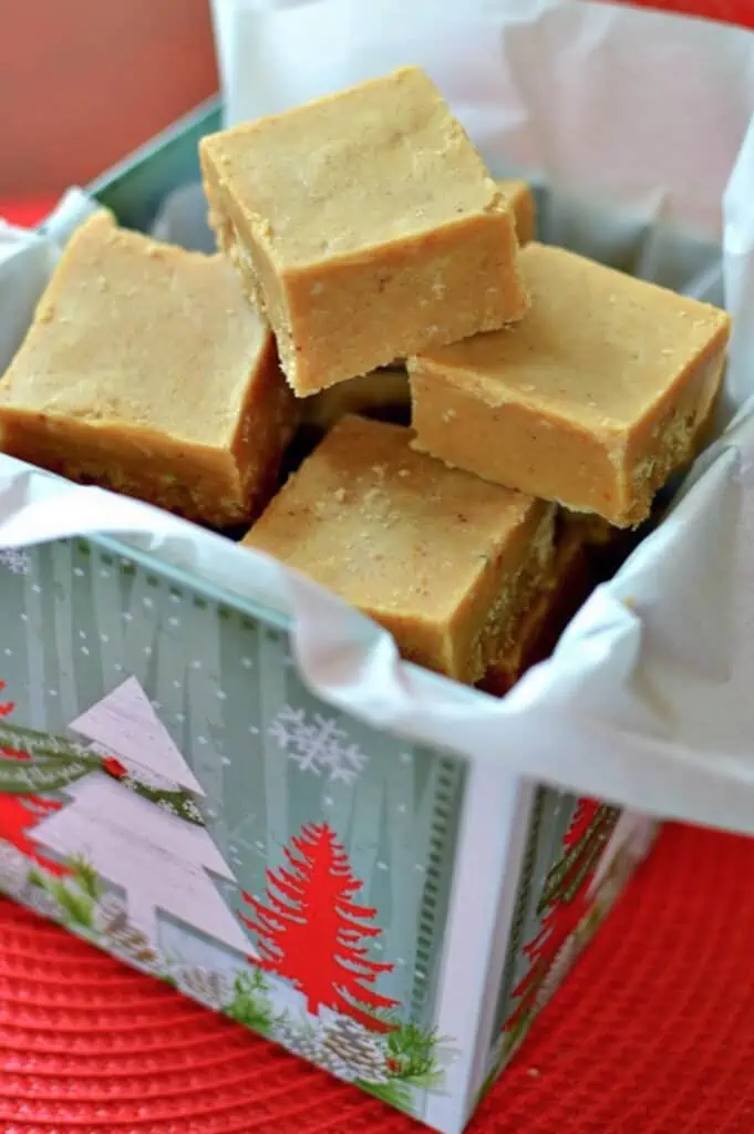 A four-ingredient fudge with a classic peanut butter flavor is made super easy in the microwave in less than 10 minutes making it ideal for the holiday season.  