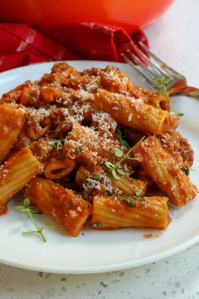 Pasta Bolognese is a traditional Italian recipe made with pancetta, ground beef, onions, carrots, celery, and tomatoes all slowly simmered into a sauce.