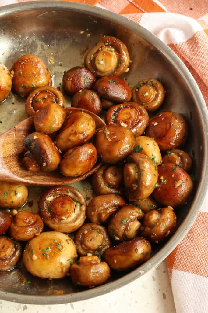 On the table in less than 15 minutes, these Garlic Butter Mushrooms are so tasty and easy making them the perfect side or topping for so many dishes. 