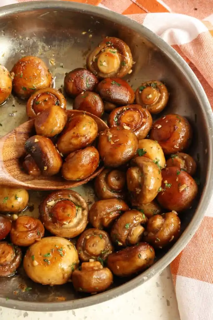 On the table in less than 15 minutes, these Garlic Butter Mushrooms are so tasty and easy making them the perfect side or topping for so many dishes. 