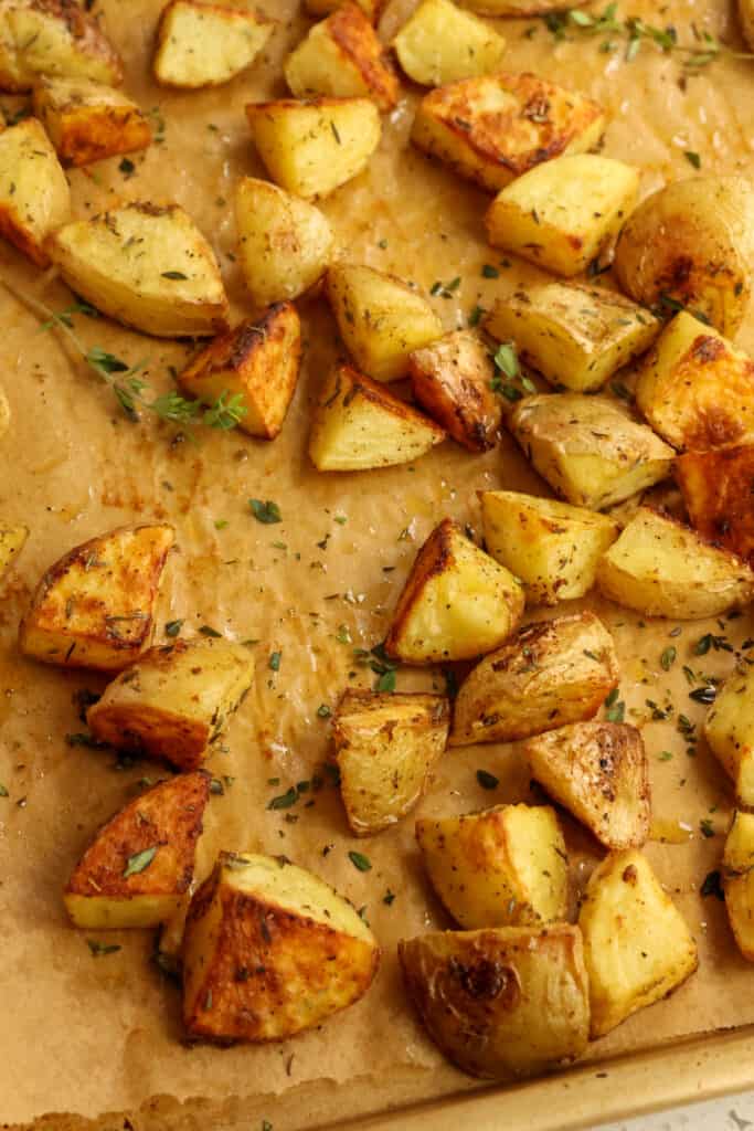 Oven-roasted potatoes make an incredibly easy and tasty side dish that goes with almost anything and is totally customizable to the spices in your pantry.