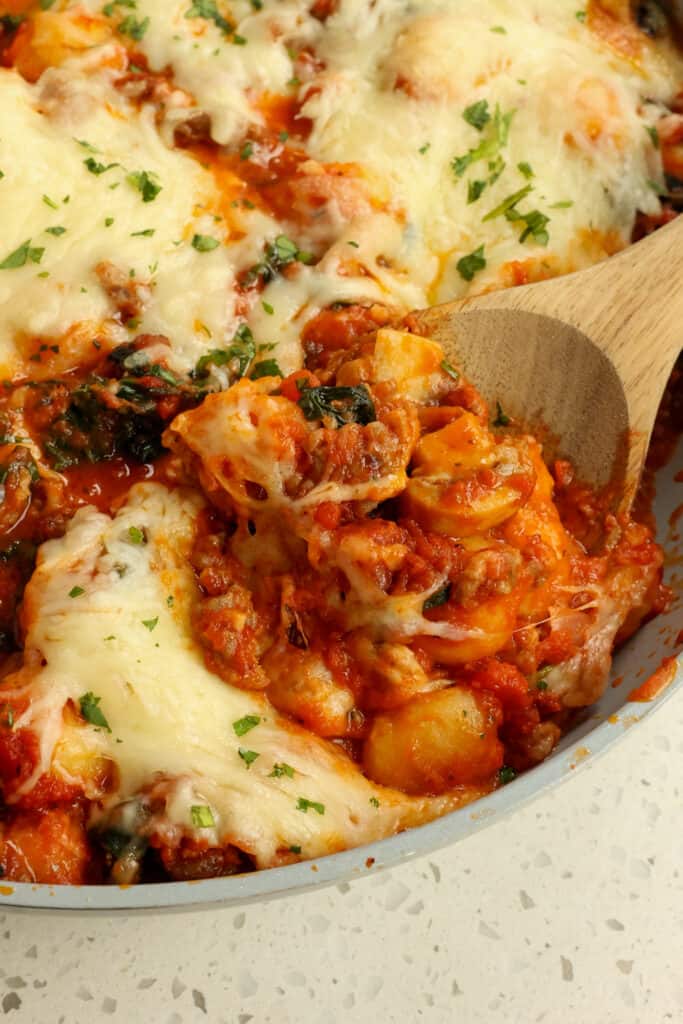 Baked Gnocchi combines Italian Sausage, onions, mushrooms, baby spinach, and garlic; all smothered in marinara and mozzarella cheese.
