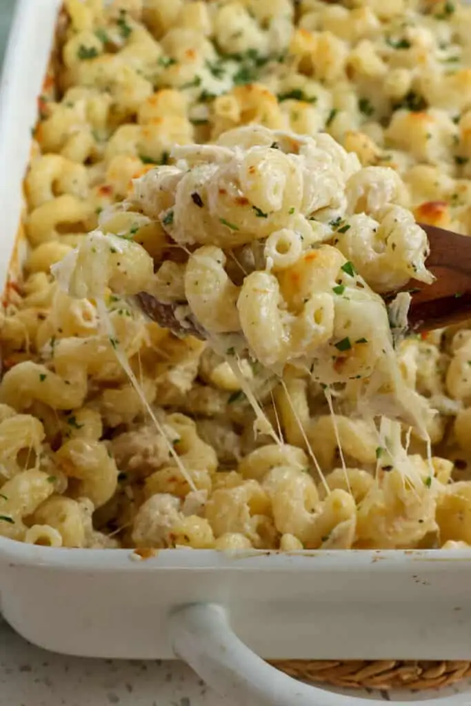 Enjoy comfort food at its best with this Chicken Alfredo Bake combines already baked rotisserie chicken with cavatappi pasta in a creamy alfredo sauce topped with melty Parmesan and mozzarella cheese.