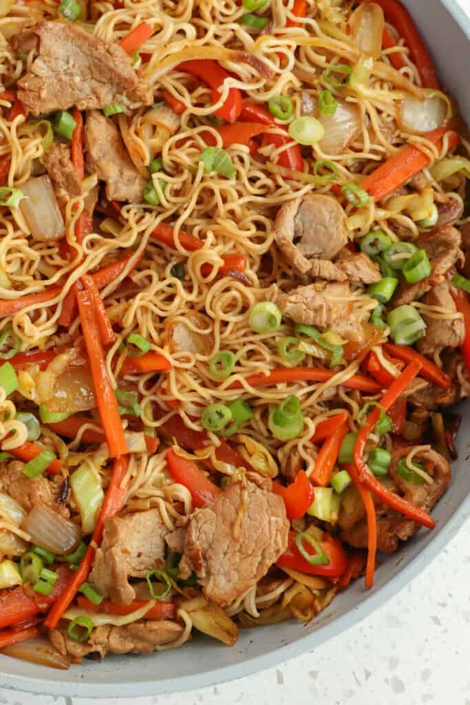 This mouthwatering good Pork lo Mein is loaded with stir-fried tender pork, onions, carrots, bell pepper, shredded cabbage, and noodles, all in an ever so slightly sweet and savory soy-based sauce. 