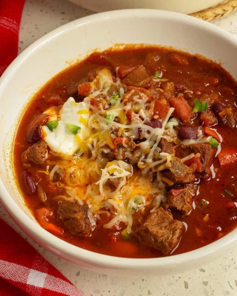 Top bowls of this Tex-Mex stew with sour cream, minced jalapeno, cheddar cheese, and cilantro. 