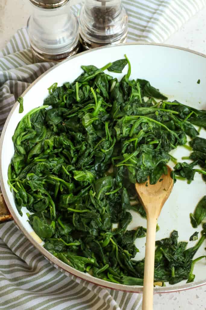 Sautéed Spinach is made easy, flavorful, and healthy with fresh garlic in just a few minutes right on the stovetop.