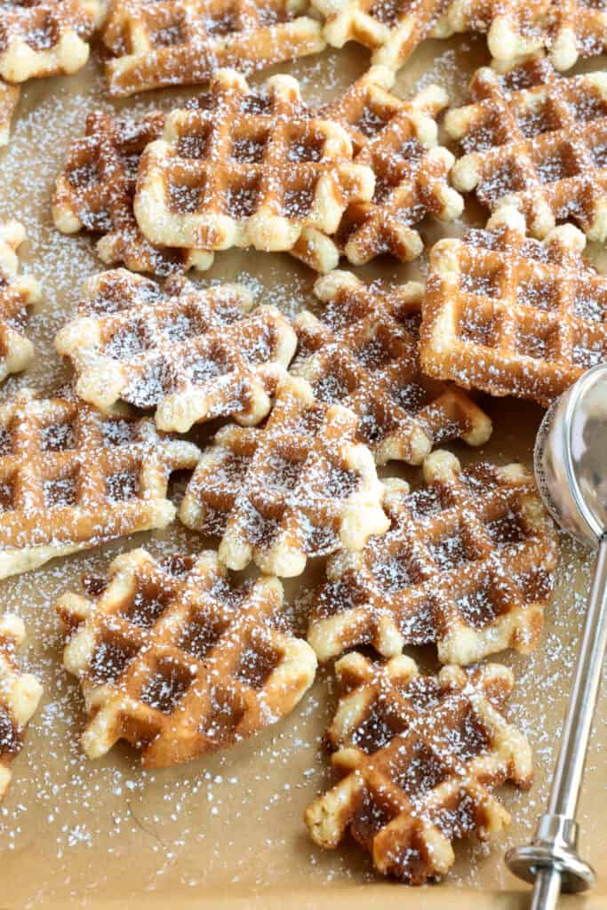 Dust the waffle cookies lightly with powdered sugar, or dunk a corner in melted chocolate and dapple with sprinkles