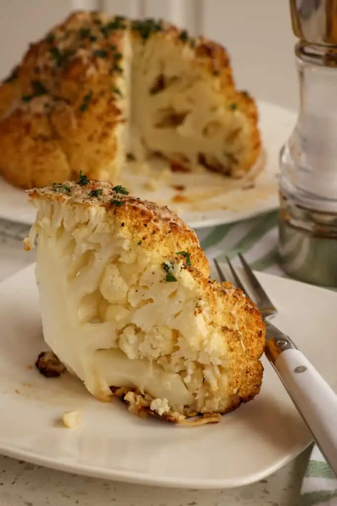 Carefully cut the cauliflower into wedges. 