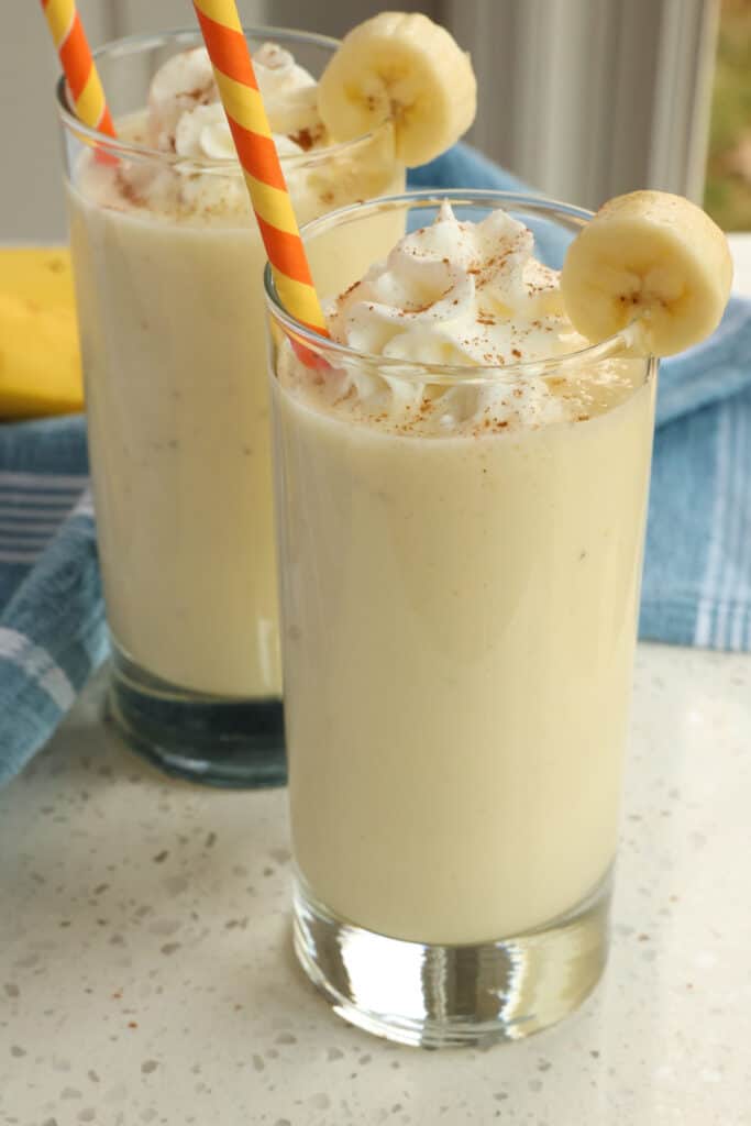 This quick and easy Banana Smoothie Recipe is made with just five ingredients in less than five minutes in a blender. 