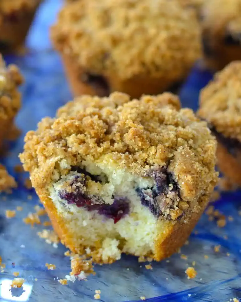 These blueberry muffins are slightly crunchy on the outside, tender and soft on the inside, and plump full of sweet juicy blueberries with a delectable sweet cinnamon crumb topping. 