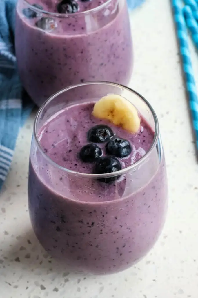 A delicious Blueberry Smoothie recipe made quick and easy with just four ingredients. Enjoy this tasty treat for breakfast or as an aftenoon snack.