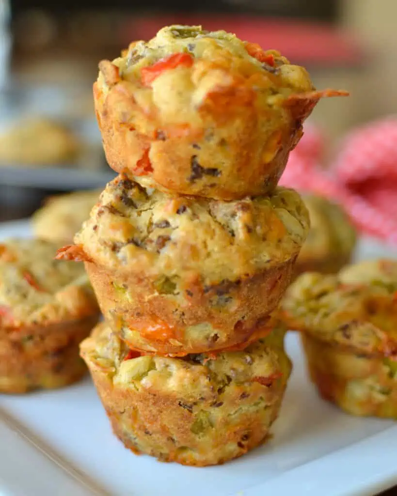 These delectable Breakfast Muffins are loaded with pork sausage, sweet red bell peppers, green chiles, and sharp cheddar. 
