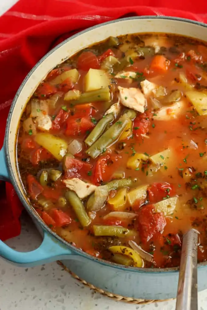 This healthy Chicken Vegetable soup is full of carrots, onions, potatoes, green beans, bell peppers, and tomatoes.  