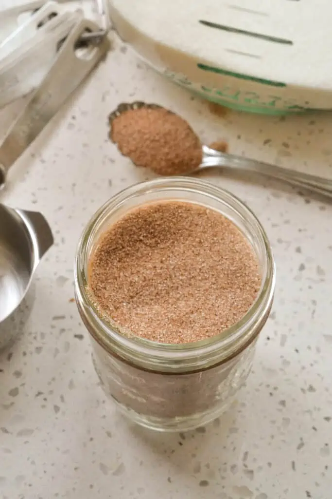 This fun and easy Cinnamon Sugar with the perfect ration of cinnamon comes together in less than 1 minute.  It is delicious on hot cereals, fresh donuts, and rice pudding, and sprinkle over muffins, quick-breads, cakes, and pies before baking.  