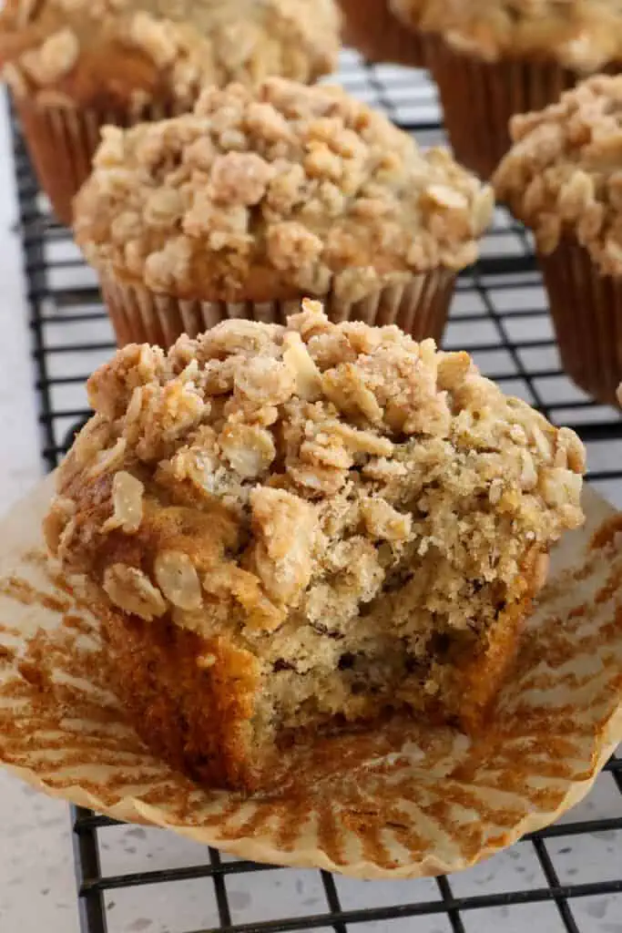 Moist and easy bakery-style Banana Oatmeal Muffins with a sweet and crunchy five-ingredient oatmeal topping