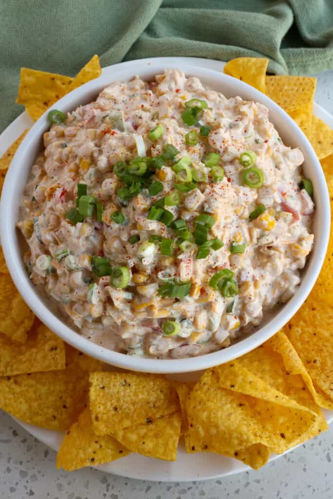 This Corn Dip is seasoned with chili powder, paprika, and ground cayenne, giving it a Mexican street corn flair. 