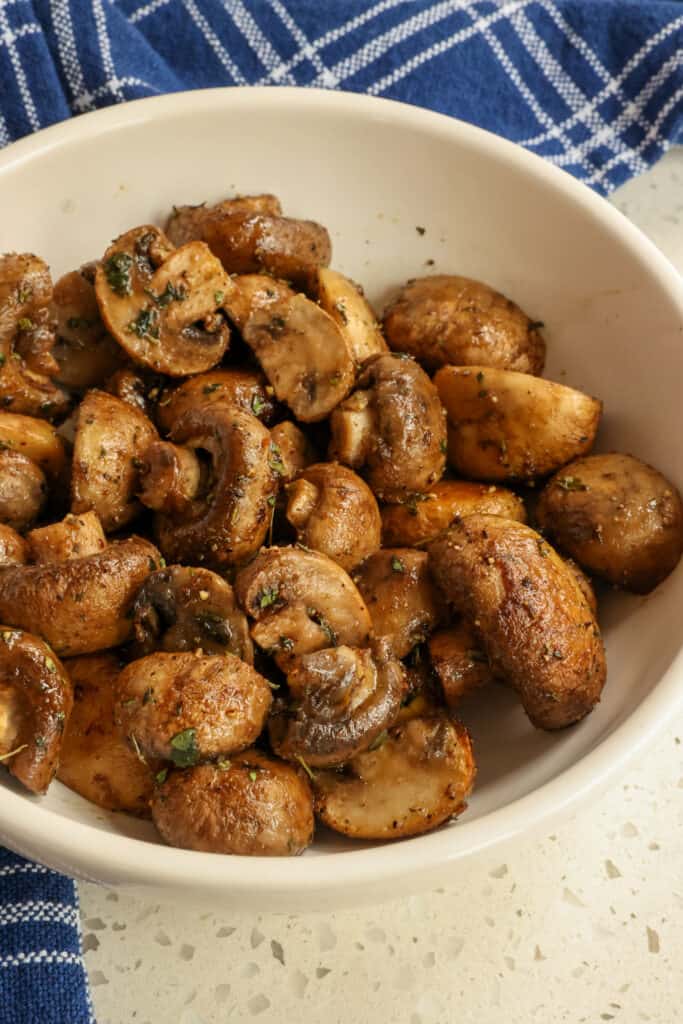 Easy Roasted Mushrooms are seasoned with a few common pantry spices, drizzled with olive oil, and then roasted in the oven at high heat. 