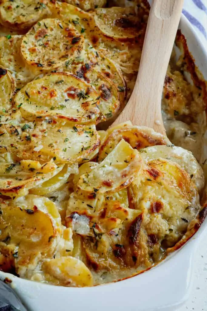 These scalloped potatoes are hands down, one of our favorite side dishes. It is easy to make, delicious, reheats well, and goes with almost any main course. 