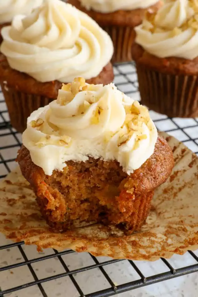 These delicious moist Carrot Cake Cupcakes with crushed pineapple and the perfect blend of spices, all topped with a homemade cream cheese frosting. 