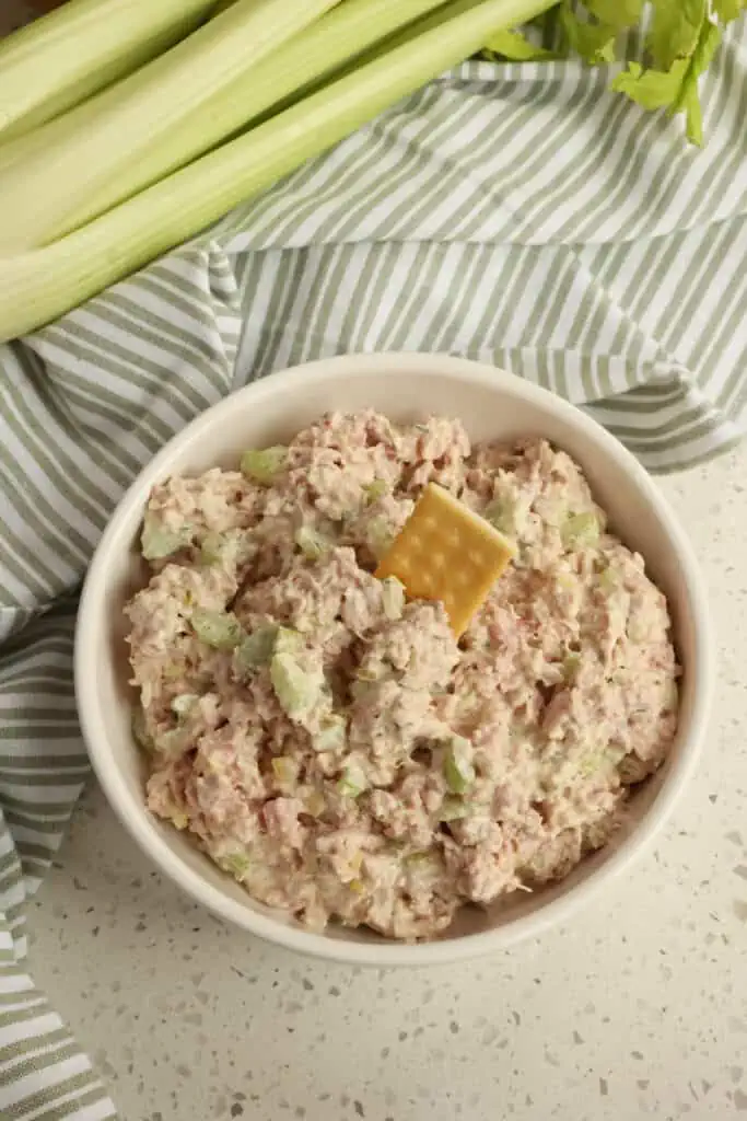 This delicious easy Ham Salad is made with finely chopped ham, onions, celery, sweet relish, dill weed, mayonnaise, and a little bit of mustard. 