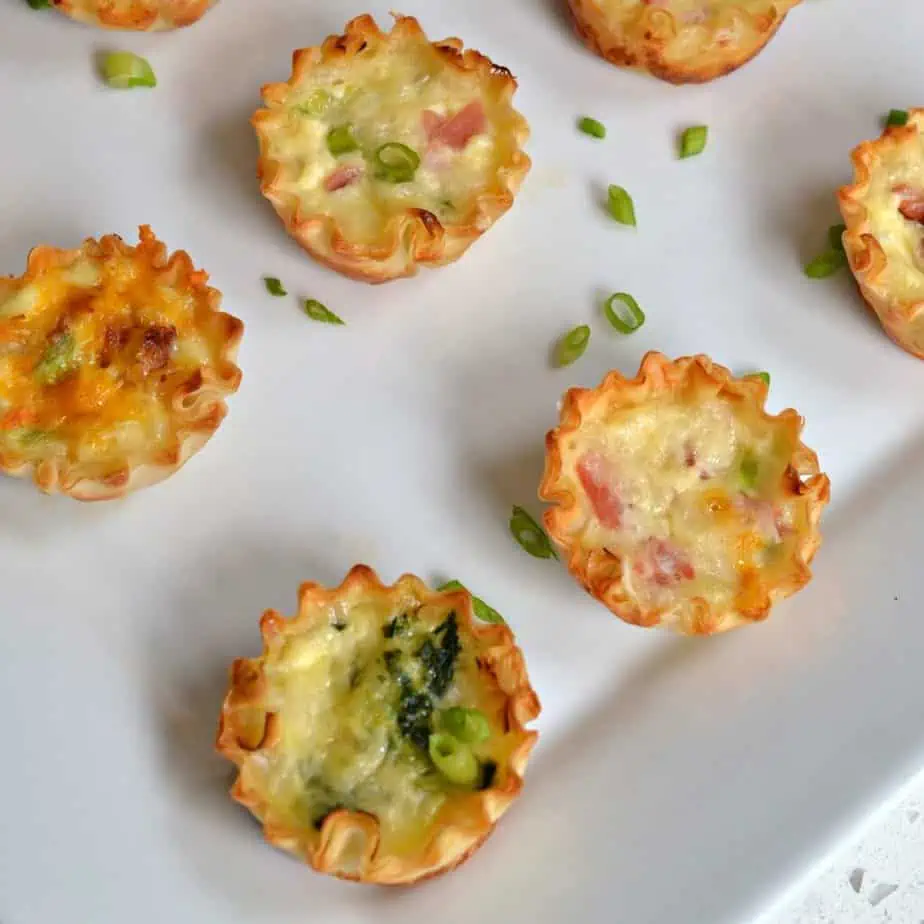 This easy mini quiche recipe comes together quickly using mini phyllo shells and an assortment of simple ingredients that you may have on hand.