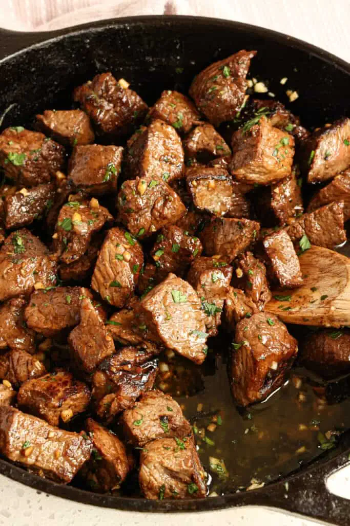 Tender Steak Bites in delicious garlic butter are an easy appetizer or main entree.