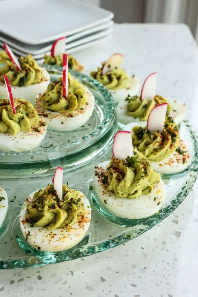  Full of protein, healthy fats, and fiber, these tasty avocado deviled eggs will become your new favorite appetizer.