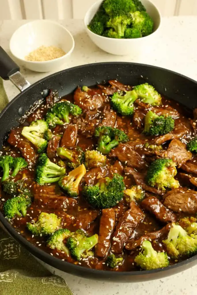A delicious and easy one-skillet beef and broccoli stir fry recipe made with a delectable sweet and salty garlic ginger sauce.