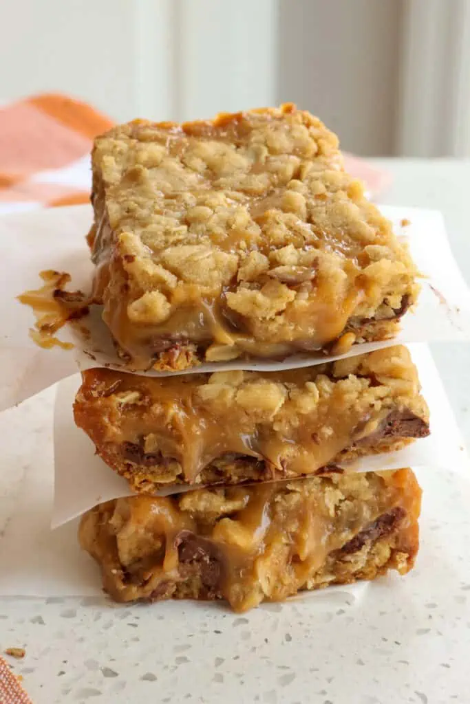 These easy Carmelita Bars are a caramel lover's dream come true, with soft gooey caramel and chocolate sandwiched between layers of buttery sweet oatmeal crumbs.