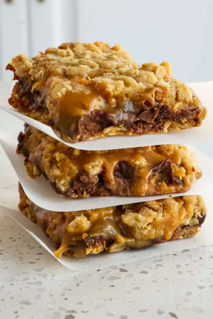 These easy Carmelitas are buttery, brown, sugar, oatmeal bar cookies oozing with chocolate chips and caramel sauce.