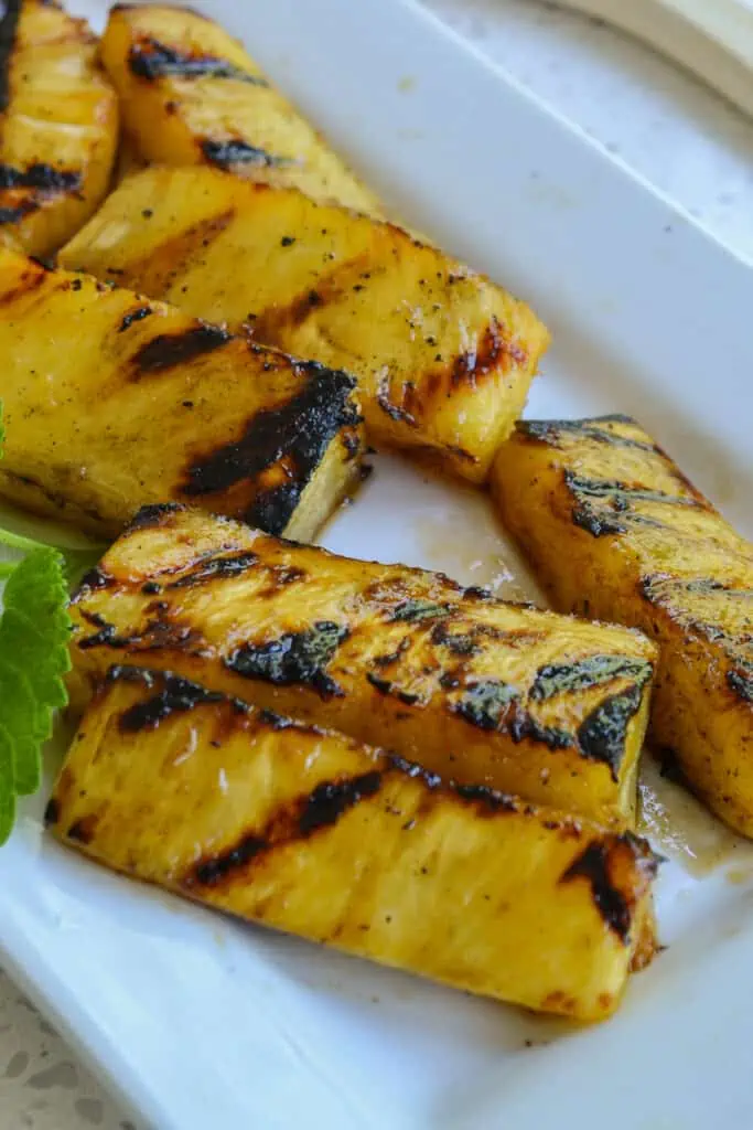Grilled Pineapple is so easy to prepare and tastes absolutely amazing. I love to serve it with grilled chicken, pork, or burgers. 