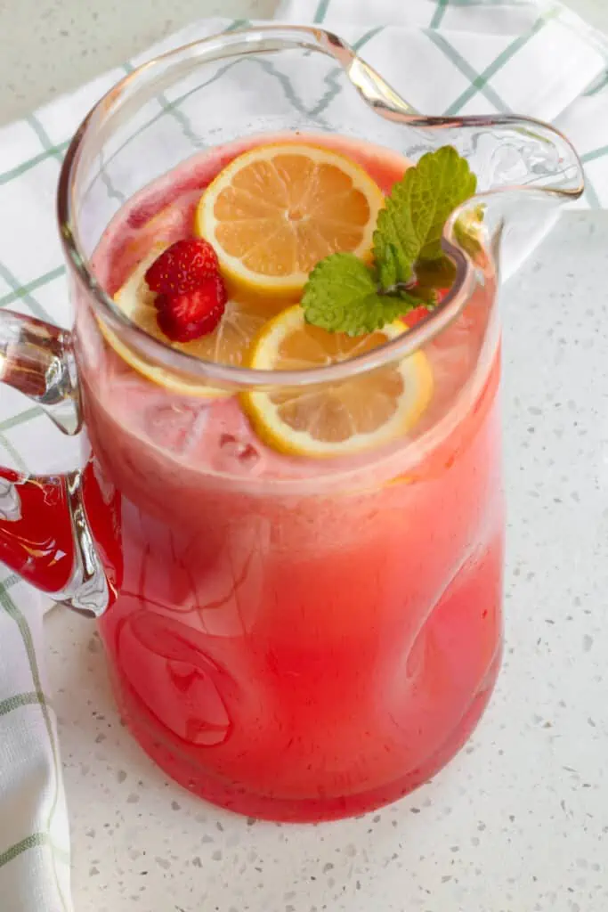 With just a handful of ingredients and a few minutes, this refreshing Strawberry Lemonade made with fresh strawberries and lemons is perfect for all your summer entertaining needs.  