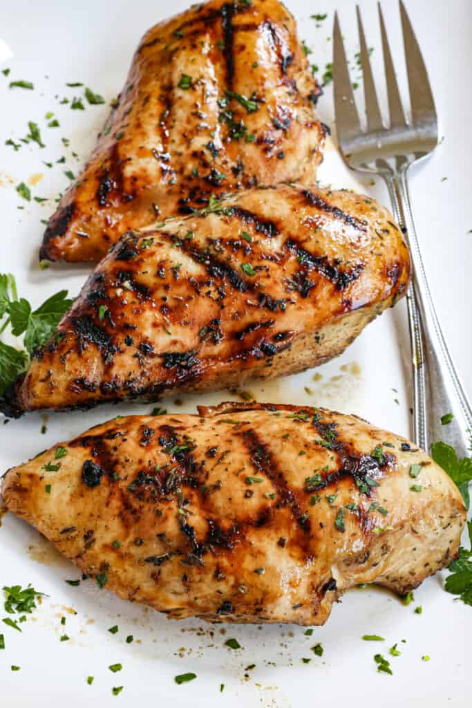 This Chicken Marinade is made with eight simple ingredients in less than five minutes, and the chicken always cooks up so tender and flavorful. 