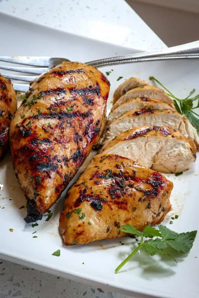 This easy Chicken Marinade comes together in minutes, and it leaves your grilled or baked chicken moist and tender with the best flavor from garlic, thyme, and marjoram.
