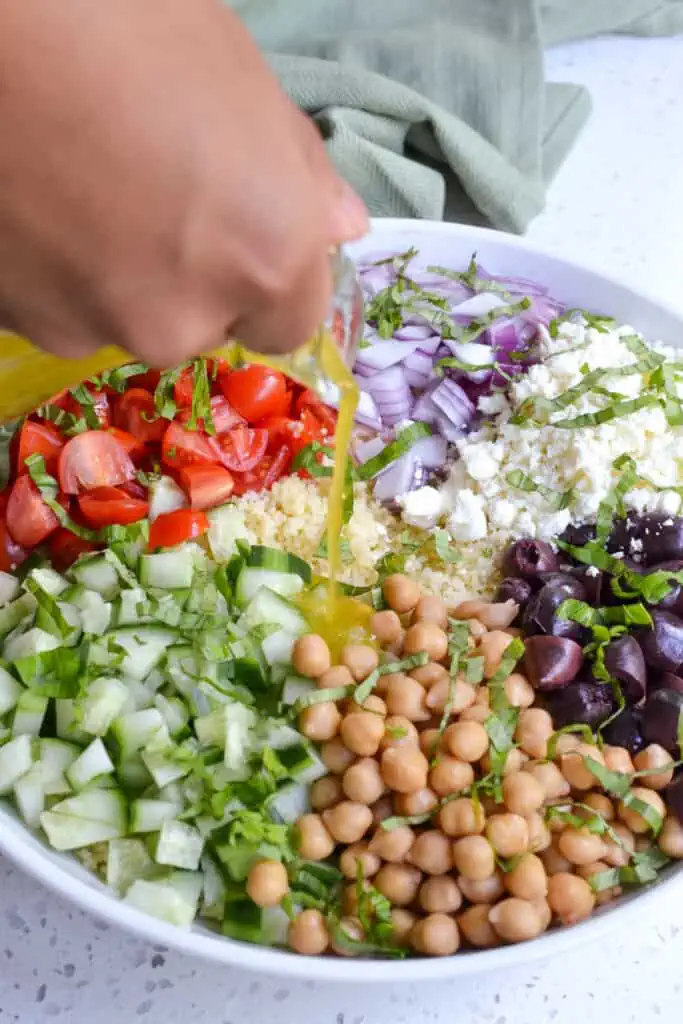 Pour the lemon vinaigrette over the pasta salad and toss to coat.  Refrigerate until ready to serve.