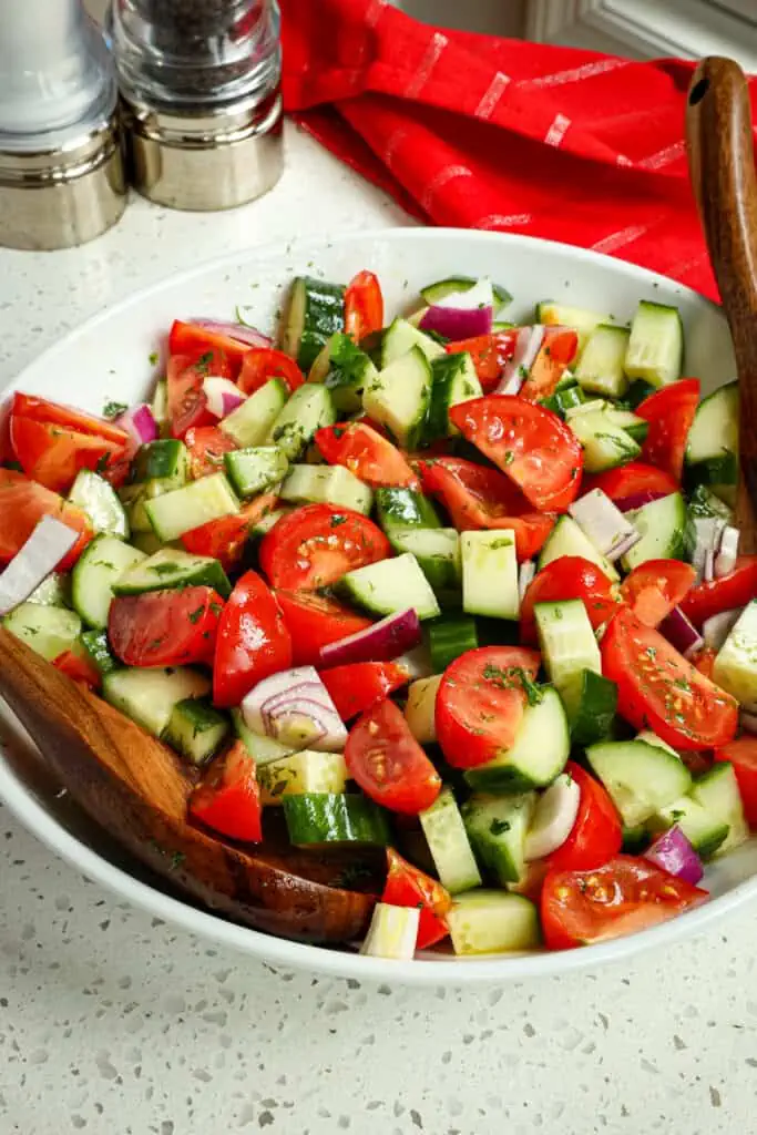 Cucumber Tomato Salad is a great vegetarian lunch or light dinner for those hot summer days when turning on the stove is unwanted. 