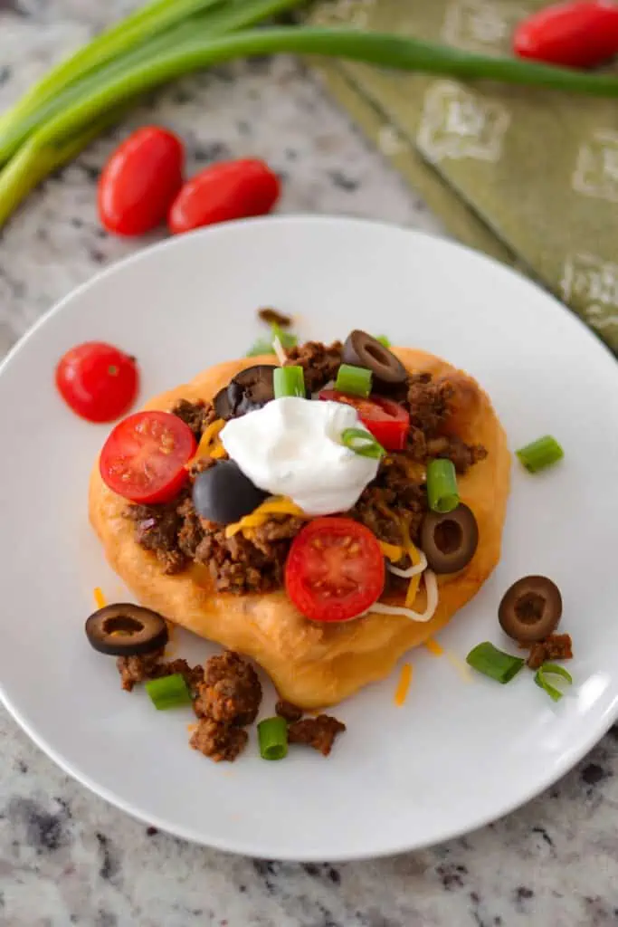 Fry Bread batter is a four-ingredient bread that fries up crunchy and crispy on the outside while light, tasty, light, and tender on the inside.