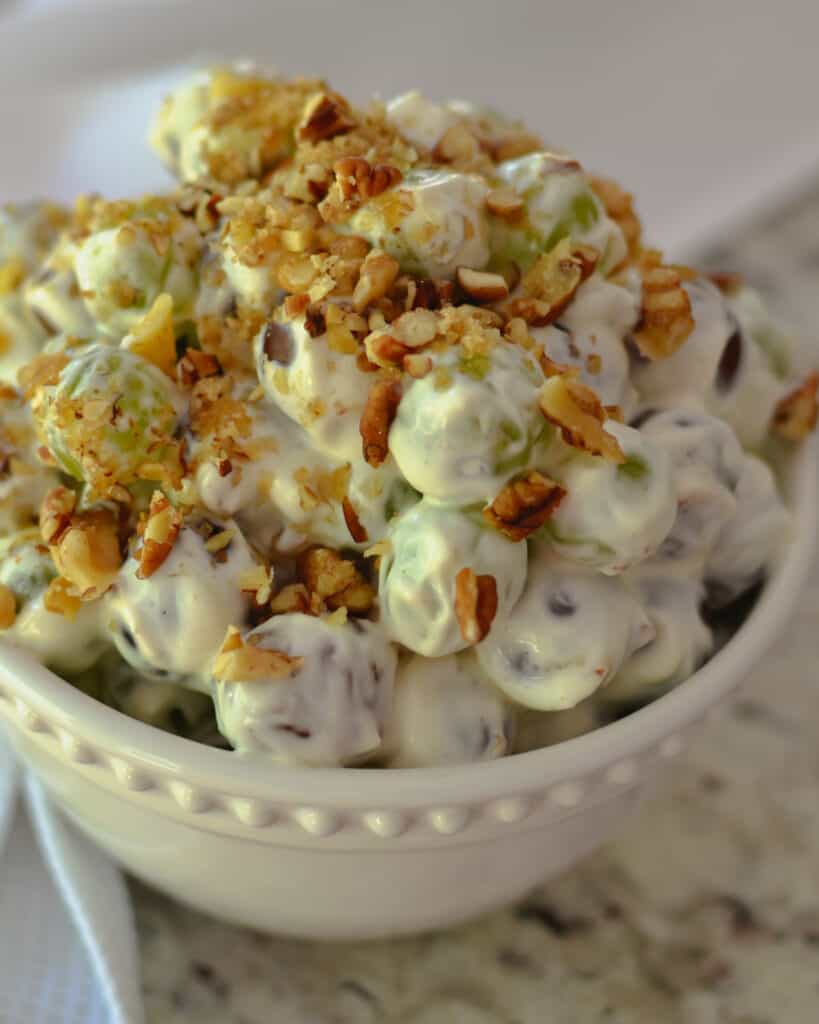 Tasty and Easy Crunchy Grape Salad This summer delight is a must-try. Grape Salad comes together in about ten minutes and makes for the perfect side dish, potluck, party salad, or dessert.