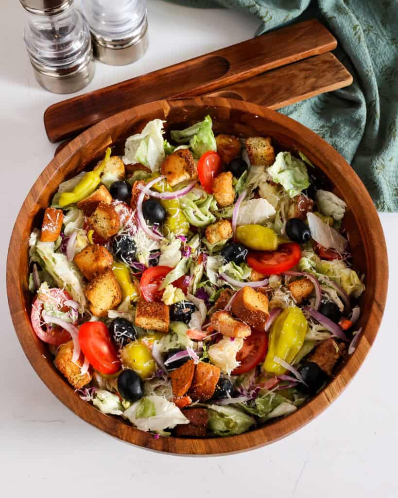 Homemade Croutons An overhead view of homemade croutons on top of copycat Olive Garden salad.