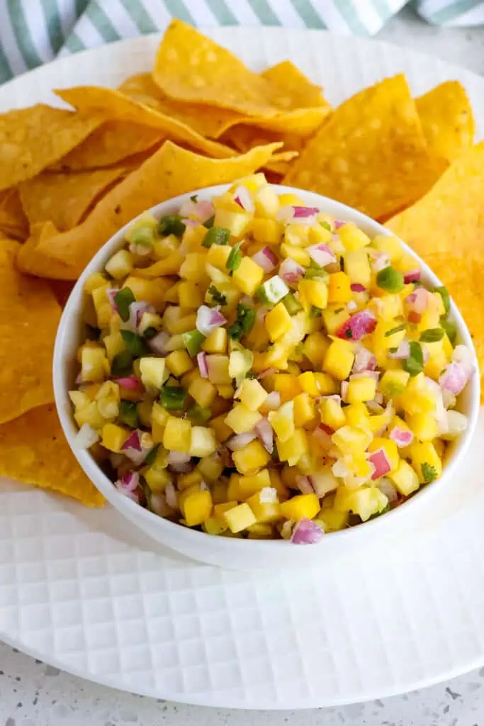 This delicious Mango Salsa is made easy with fresh mangoes, jalapeño, red onion, cilantro, fresh lime juice, and a couple of simple pantry seasonings.