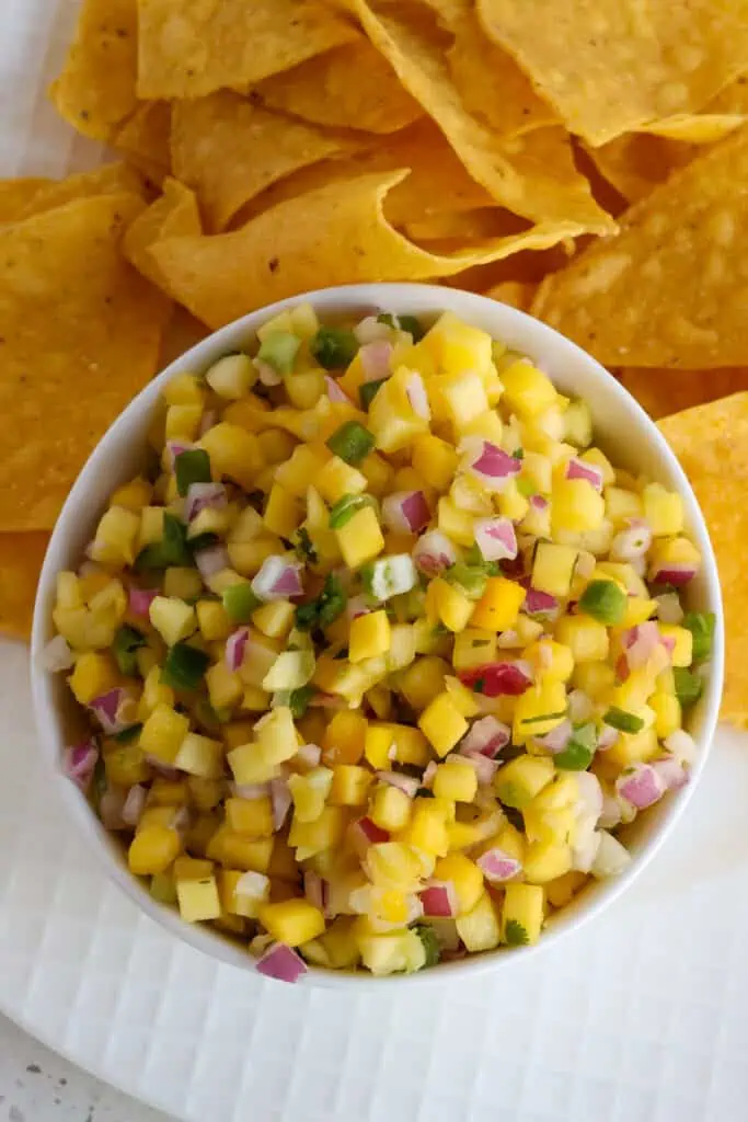 A bright and colorful delicious Mango Salsa made with eight easy ingredients in about ten minutes.
