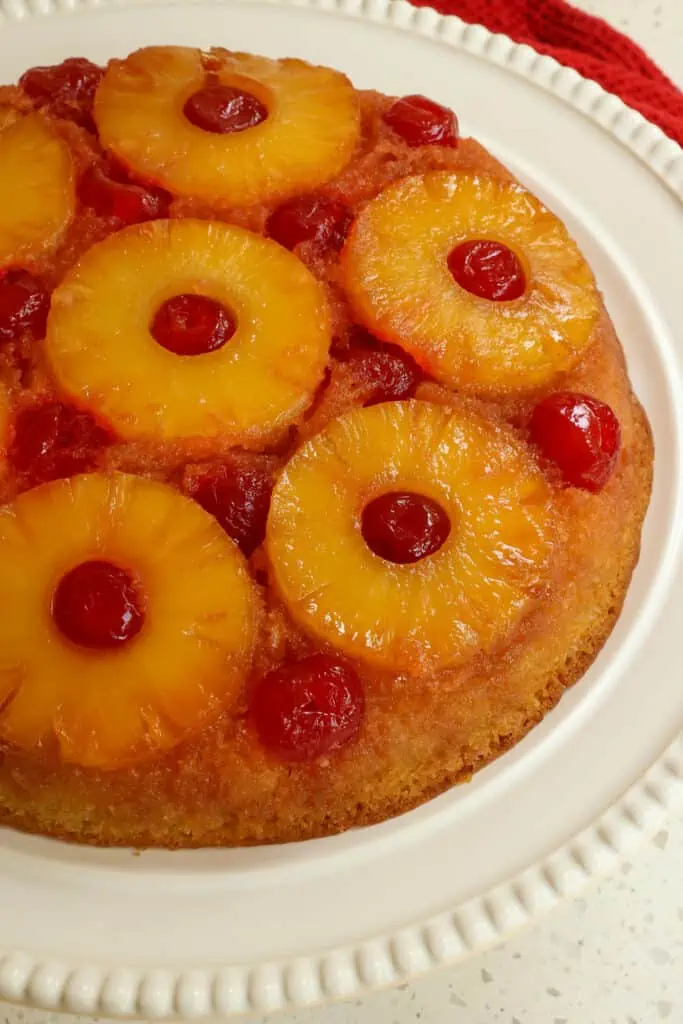 This beautiful Pineapple Upside Down Cake bakes up perfectly in a cast iron skillet. With its crispy golden brown sweet edges and sweet pineapple caramelized top, this cake is always a huge hit. 