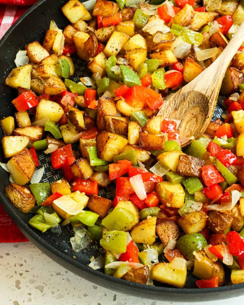 Add the cooked vegetables back to the skillet and stir to combine and warm. Season with kosher salt and fresh ground black pepper. 