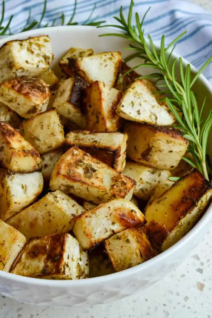 Add another healthy vegetable to your rotation with these easy Roasted Turnips.  With some common pantry ingredients and about ten minutes of prep time, this tasty vegetable is ready to put in the oven and roast. 