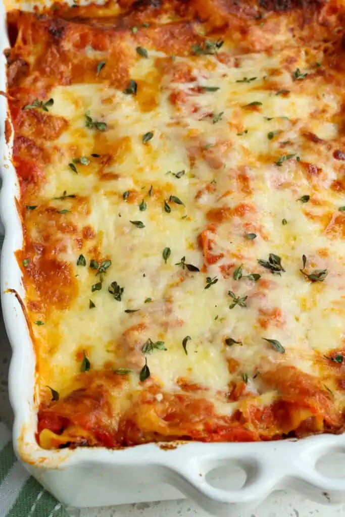 Veggie Lasagna with onions, mushrooms, zucchini, red bell peppers, and spinach. 